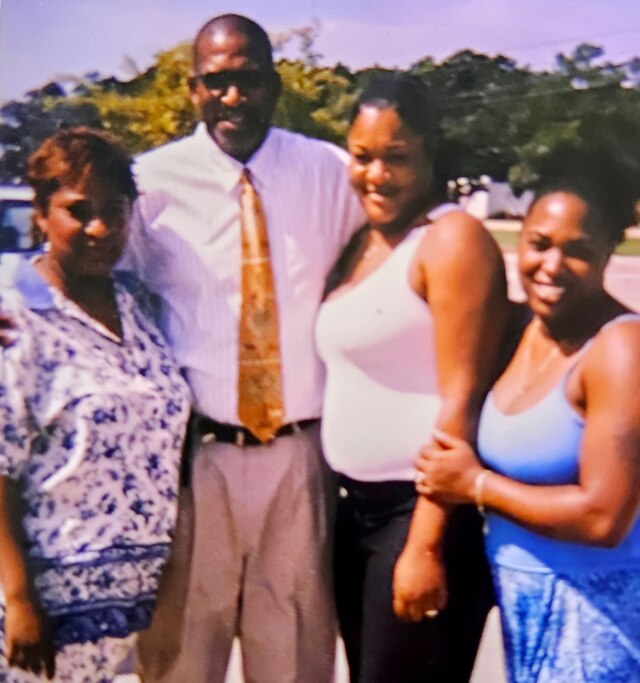 Manning with his nieces Cassandra, Helen, and Kendra.