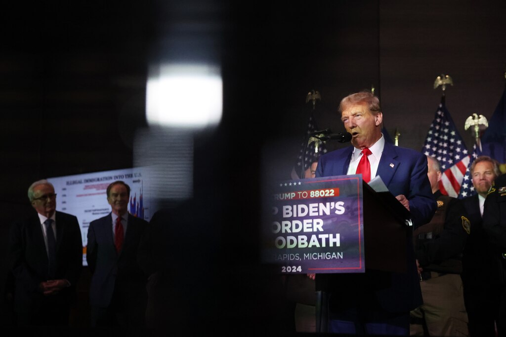 GRAND RAPIDS, MICHIGAN - APRIL 02: Former U.S. President Donald Trump speaks at a campaign event on April 02, 2024 in Grand Rapids, Michigan. Trump delivered a speech which his campaign has called "Biden's Border Bloodbath", as recent polls have shown that immigration and the situation at the U.S. Southern border continue to be top issues on voters' minds going into the November election.