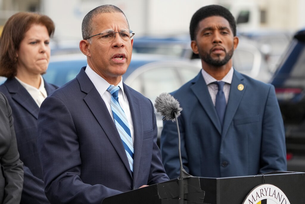 Maryland Attorney General Anthony Brown addresses reporters at a press conference outside of Curtis Bay Energy on Tuesday, October 17, 2023. Brown is flanked by Elise Chawaga from the U.S. Department of Transportation and Baltimore Mayor Brandon Scott.