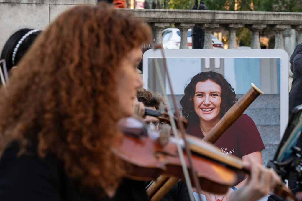 Musicians play before the start of the vigil for Pava LaPere.