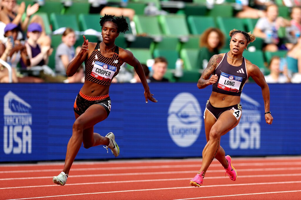 EUGENE, OREGON - JUNE 27: Elise Cooper and McKenzie Long compete in the first round of the women's 200 meters on Day Seven of the 2024 U.S. Olympic Team Track & Field Trials at Hayward Field on June 27, 2024 in Eugene, Oregon.