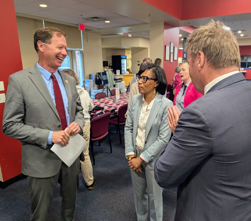 U.S. Sen. Angela Alsobrooks talks with Anne Arundel County Executive Steuart Pittman, left, and Annapolis Mayor Gavin Buckley at the Annapolis Senior Activity Center on May 28, 2025.
