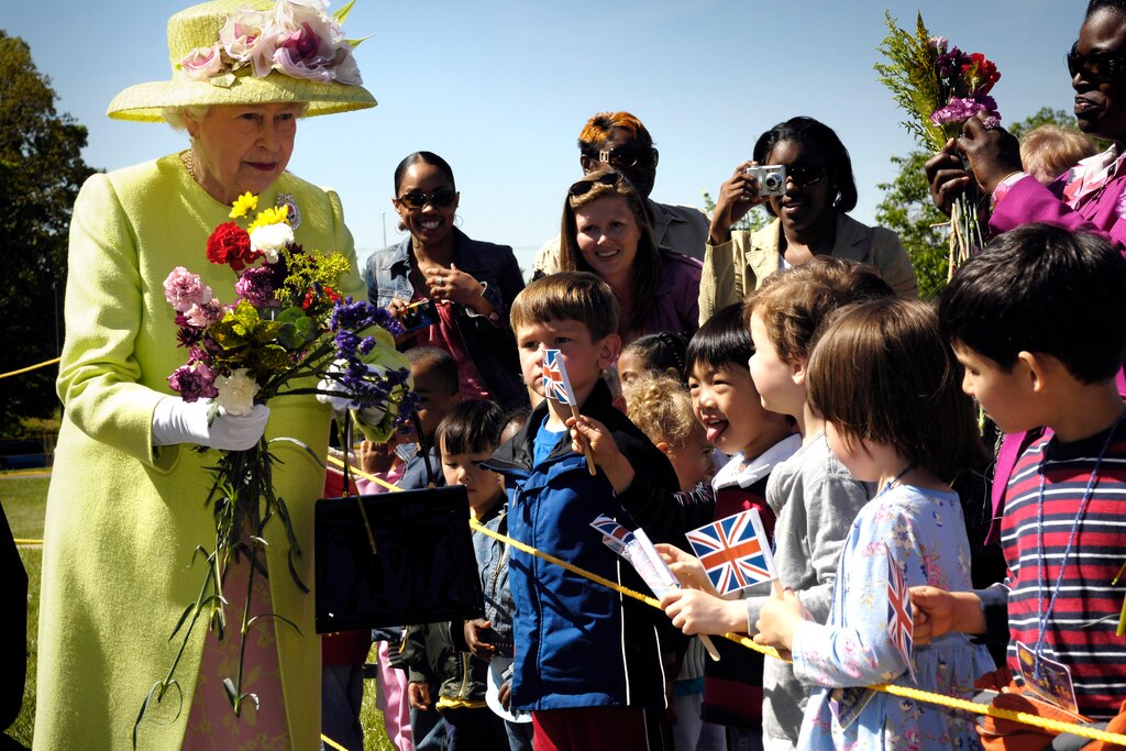 HM Queen Elizabeth II is greeted by children on her walk from NASA’s Goddard Space Flight Center mission control to a reception in the center’s main auditorium May 8, 2007 in Greenbelt, Maryland. The queen is on the last of a six-day visit to the U.S with her husband, Prince Philip, the Duke of Edinburgh.