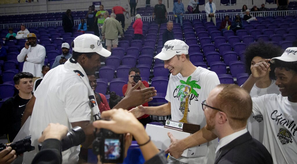 Derik Queen of Montverde Academy and Cooper Flagg after the championship game of the City of Palms tournament against Long Island Lutheran at Suncoast Credit Union Arena on Saturday, Dec. 23, 2023. Montverde won.