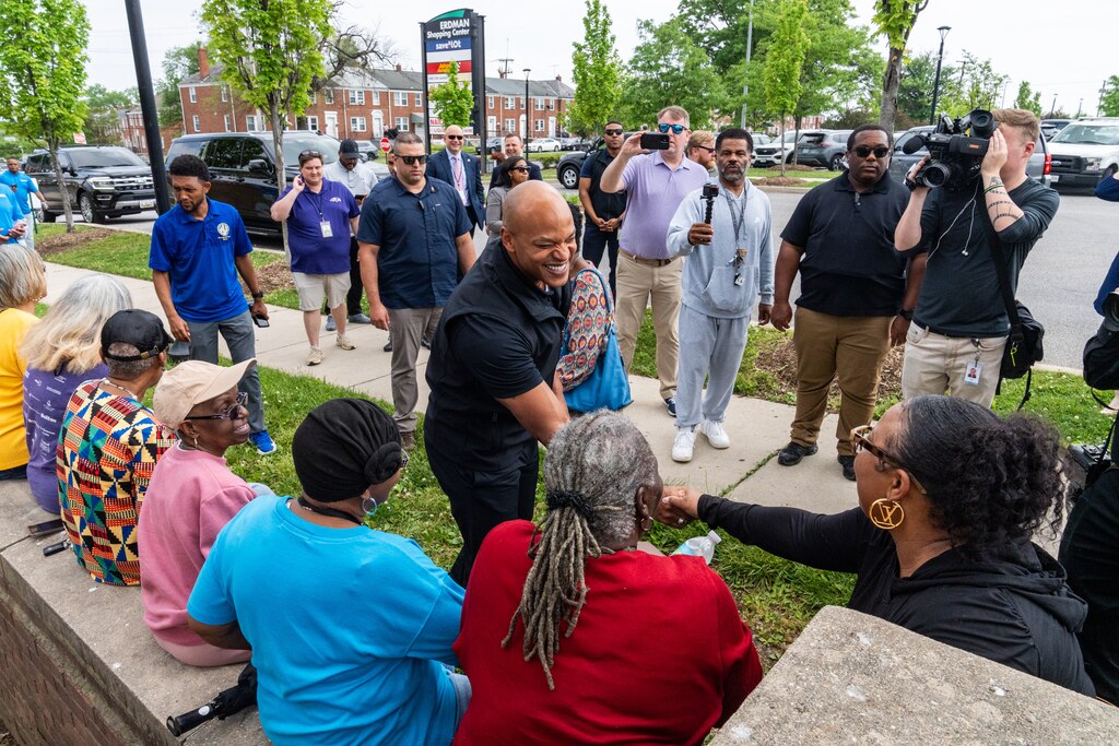 Gov. Wes Moore greets supporters outside the Enoch Pratt Free Library – Herring Run branch on May 7, 2024.