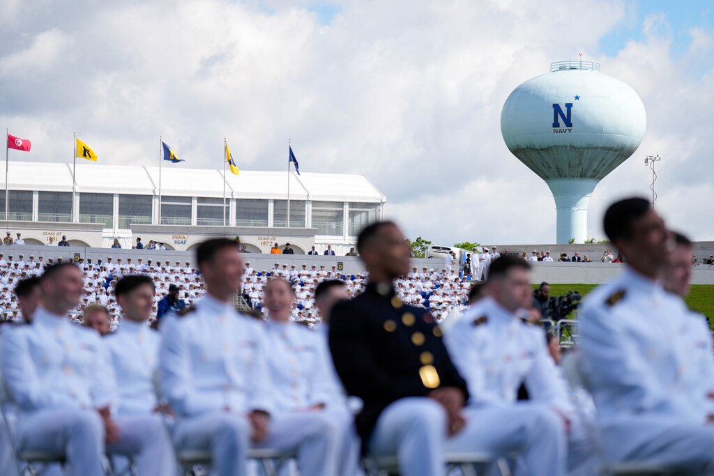 Midshipmen take their seats during the U.S. Naval Academy Class of 2025’s graduation ceremony at the Navy-Marine Corps Memorial Stadium in Annapolis, Md. on Friday, May 23, 2025.