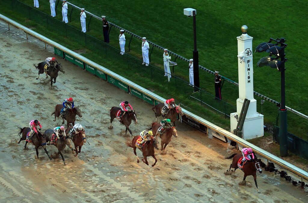 LOUISVILLE, KENTUCKY - MAY 04: Country House #20, ridden by jockey Flavien Prat, crosses the finish line to win the 145th running of the Kentucky Derby at Churchill Downs on May 04, 2019 in Louisville, Kentucky. Country House #20 was declared the winner after a stewards review disqualified Maximum Security #7.