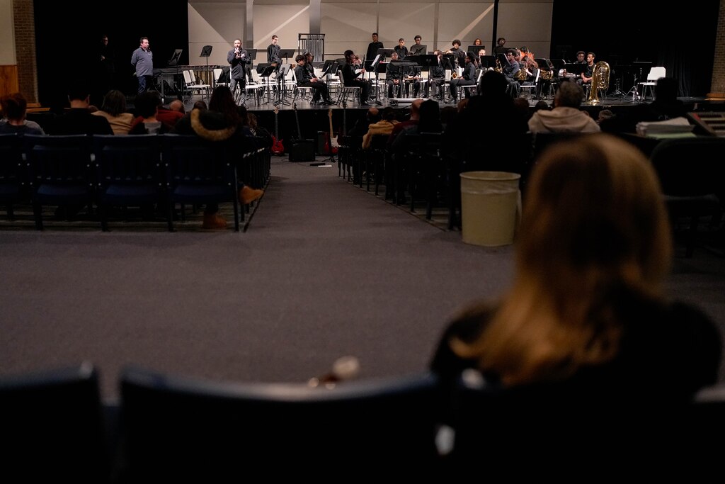 Dr. Jeffrey Fink, principal of Oakland Mills High School, welcomes guests to the school’s spring concert in Columbia, Md. on Wednesday, April 9, 2025.