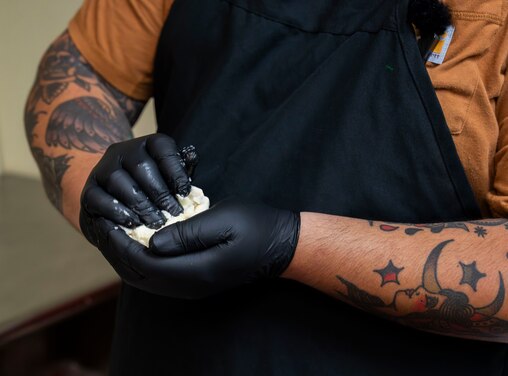 Marvin Rodriguez makes pupusas at El Paraiso on June 26, 2025.