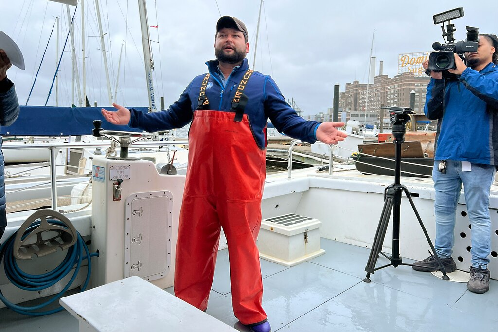 Ben Carver, captain of the Bay Foundation's workboat Snow Goose, prepares to lead a group from the Baltimore Harbor to Fort Carroll on Wednesday, May 21, 2025.