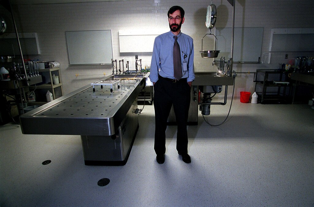 Chief Medical Examiner Jonathan Arden stands for a portrait in the autopsy area of the D.C. Medical Examiner's office, Wednesday June 25, 2003.