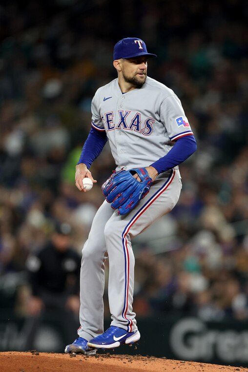 SEATTLE, WASHINGTON - SEPTEMBER 29: Nathan Eovaldi #17 of the Texas Rangers pitches during the first inning against the Seattle Mariners at T-Mobile Park on September 29, 2023 in Seattle, Washington. (Photo by Steph Chambers/Getty Images)