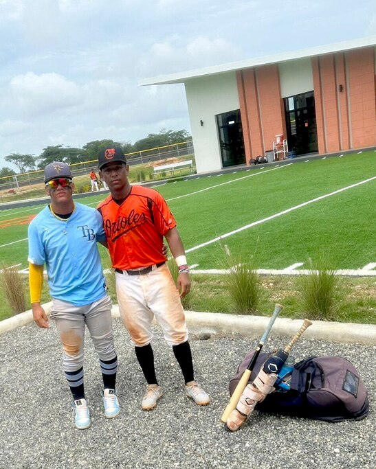Andrés Torres, left, met Luis Guevara, right, at a local baseball school when he was 5.