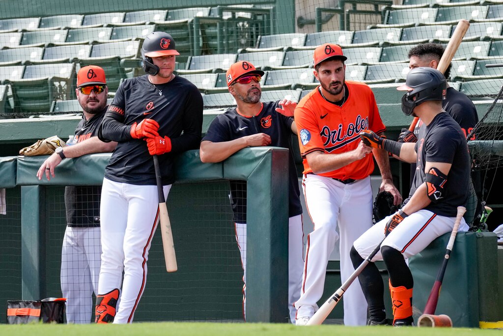 Baltimore Orioles pitcher Zach Eflin (24) fist bumps his teammates following his pitching session at batting practice during Spring Training at Ed Smith Stadium in Sarasota, Fla. on Tuesday, February 18, 2025.