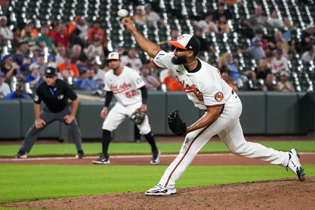 Baltimore Orioles pitcher Seranthony Domínguez (56) pitches in the 10th inning of a game against the Texas Rangers at Orioles Park at Camden Yards in Baltimore, Md. on Tuesday, June 24, 2025.