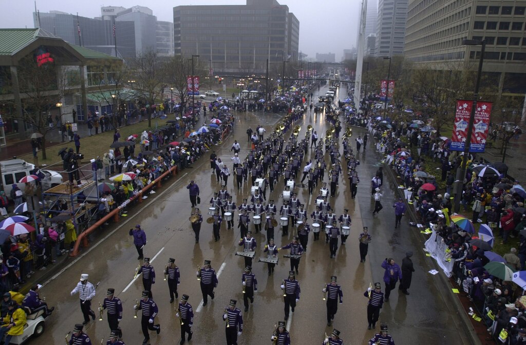 The Baltimore Ravens Marching Band leads the Super Bowl victory parade down Pratt Street along the Inner Harbor toward City Hall through the rain soaked streets of downtown Baltimore, Md., on January 30, 2001.