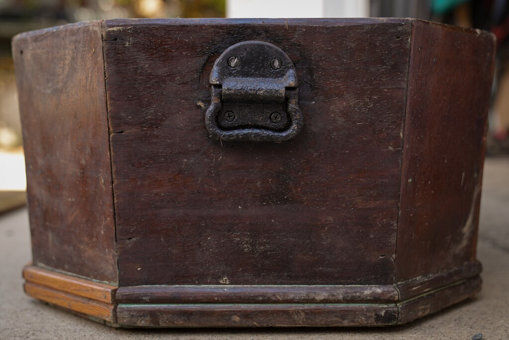 A handle on the outside of Mathilda Lorenz’s empty casket on July 28, 2022. The mysterious casket was originally found down by a stream in Wyman Park.