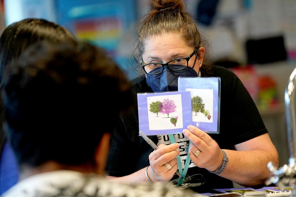 Nicole Veltre, biology teacher at Digital Harbor High School, talks about the most difficult year to be a teacher in the United States. Nicole works with students with visual aids on the similarity of trees.
