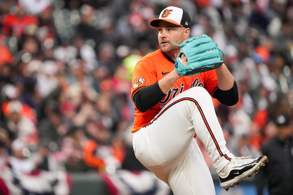 Baltimore Orioles relief pitcher Danny Coulombe (54) delivers a pitch in a game against the Los Angeles Angels at Camden Yards on March 30, 2024. The Baltimore Orioles beat the Angels, 13-4, to clinch a series win.