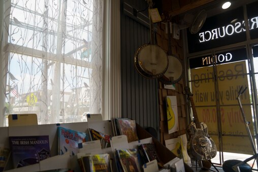 Banjos and music books are placed at the front of the Appalachian Bluegrass Shoppe in Catonsville, Baltimore County, Md. on July 2, 2025.