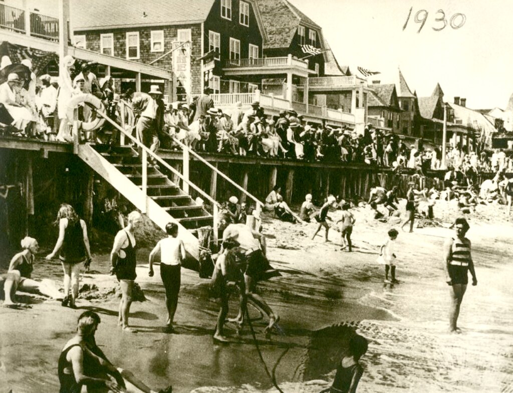 The beach and boardwalk at Ocean City in 1930.