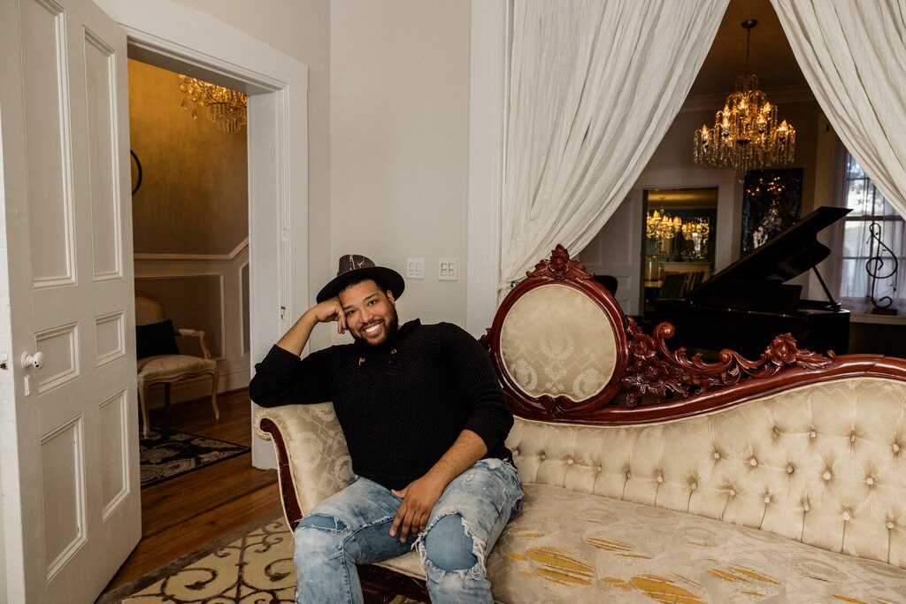 BALTIMORE, MD - DECEMBER 8, 2024: Donnell Nance poses for a portrait in his home during the Annual Union Square Cookie Tour in Baltimore, Maryland on December 8, 2024.