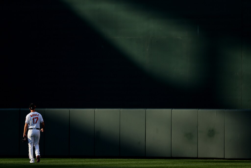 BALTIMORE, MD - JULY 30: Pitcher Brian Matusz #17 of the Baltimore Orioles walks to the bullpen before playing the Houston Astros at Oriole Park at Camden Yards on July 30, 2013 in Baltimore, Maryland.