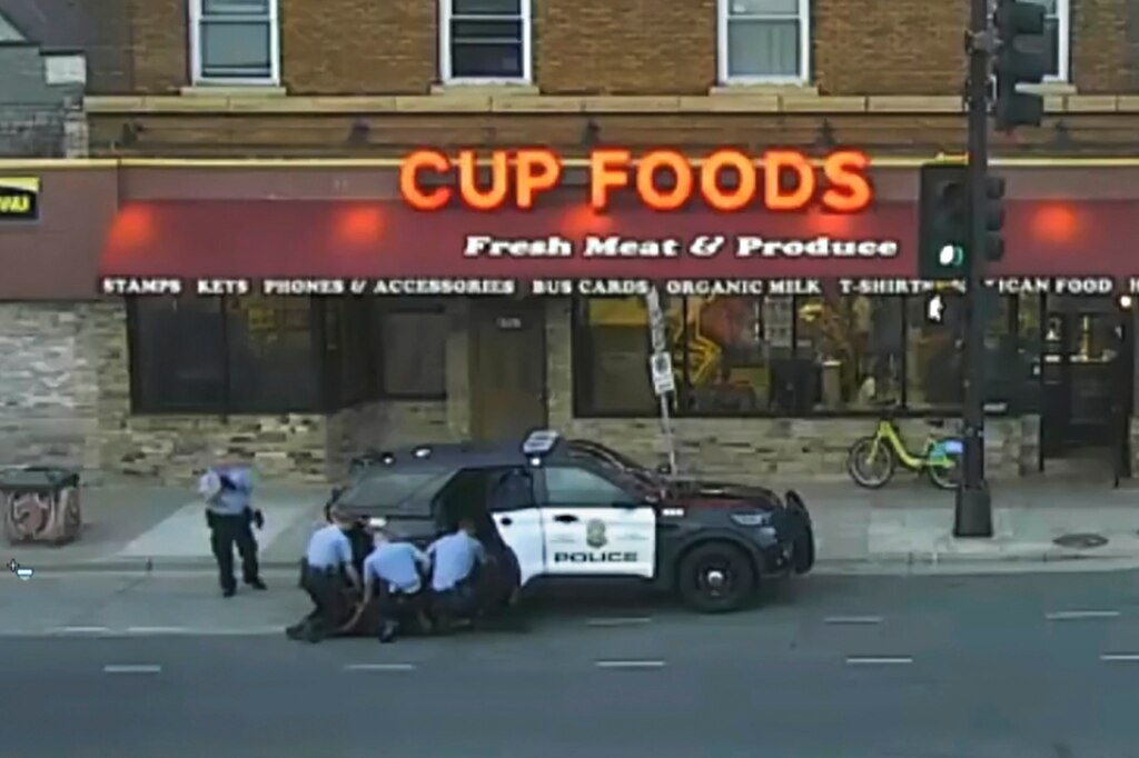 In this image from surveillance video, Minneapolis police officers from left, Tou Thao, Derek Chauvin, J. Alexander Kueng, and Thomas Lane attempt to take George Floyd into custody in Minneapolis, Minn., on May 25, 2020. The three Minneapolis officers who didn't stop Chauvin from kneeling on Floyd's neck as the Black man said he couldn't breathe were all convicted of federal civil rights violations for their failure to intervene. Experts agree that peer pressure and, in some cases, fear of retribution, are on the minds of officers who fail to stop colleagues from doing bad things.