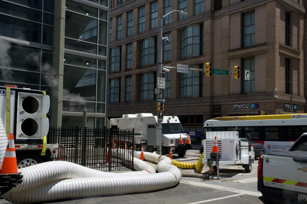 BGE Crews conduct work at the intersection of South Street and E. Baltimore Street on July 11, 2025. On June 28, 2025, an underground fire on the 300 block of E. Baltimore Street caused road closures and outages of some traffic and street lights.