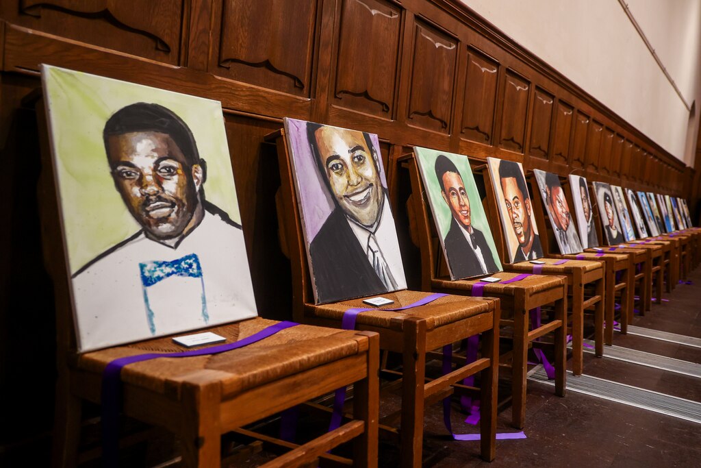 Sunday, Feb. 2, 2025 — Paintings of those who lost their lives to gun violence sit on chairs with purple ribbons in the seats.