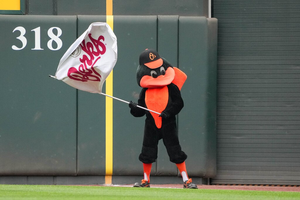 The Oriole Bird waves the Berks Flag following a Hot Dog Race in a game between the Baltimore Orioles and the Chicago White Sox at Oriole Park at Camden Yards in Baltimore, Md. on Friday, May 30, 2025.