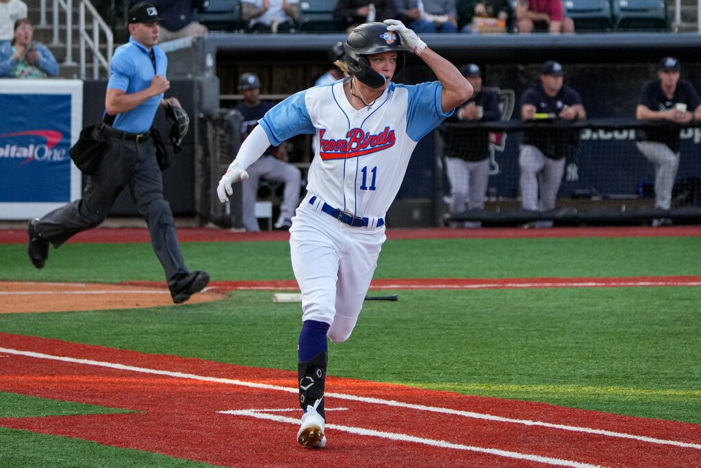 Aberdeen IronBirds shortstop Jackson Holliday (11) runs to first base after singling in a game against the Hudson Valley Renegades at Leidos Field at Ripken Stadium on Tuesday, May 9. This game against the Renegades was Holliday’s home debut for the IronBirds.