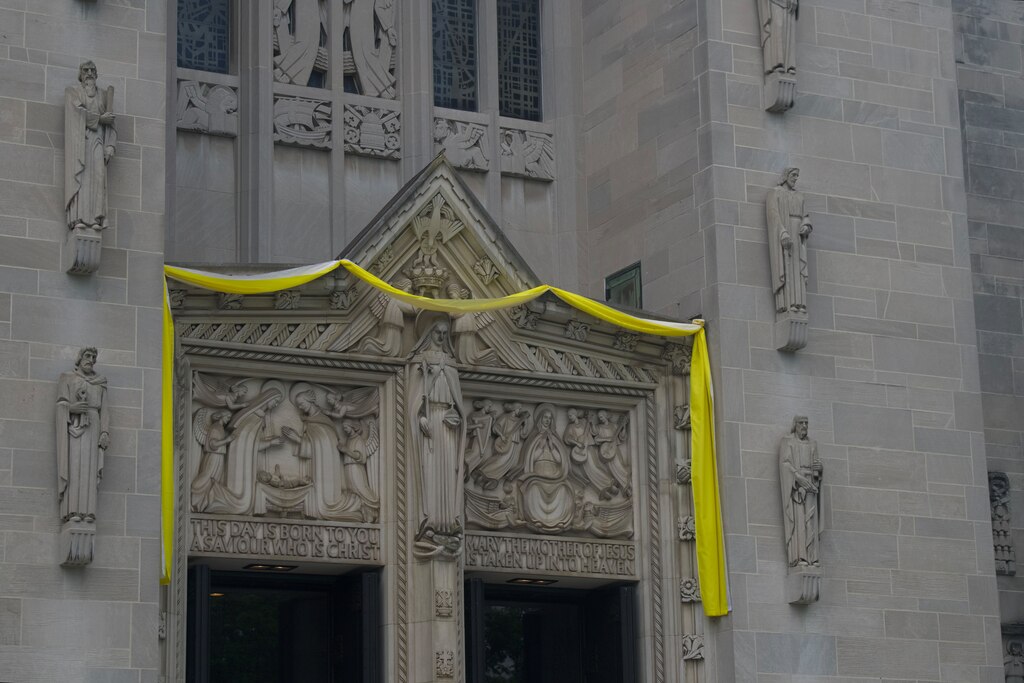 A gold bunting hangs across the main entrance to Mary Our Queen Cathedral on May 7, 2025 after a new pope was chosen. Gold signifies a new pope, whereas black signifies a deceased one.