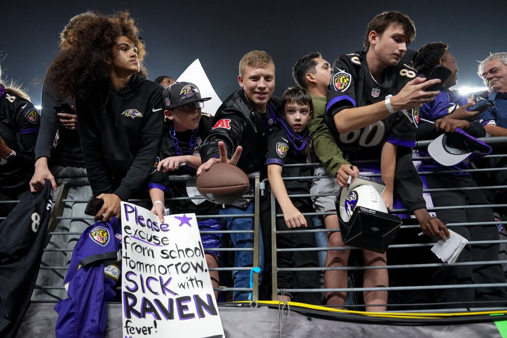 Baltimore Ravens fans hope for autographs as players return to the locker room following a game against the Buffalo Bills at M&T Bank Stadium in Baltimore on Sunday, September 29, 2024.