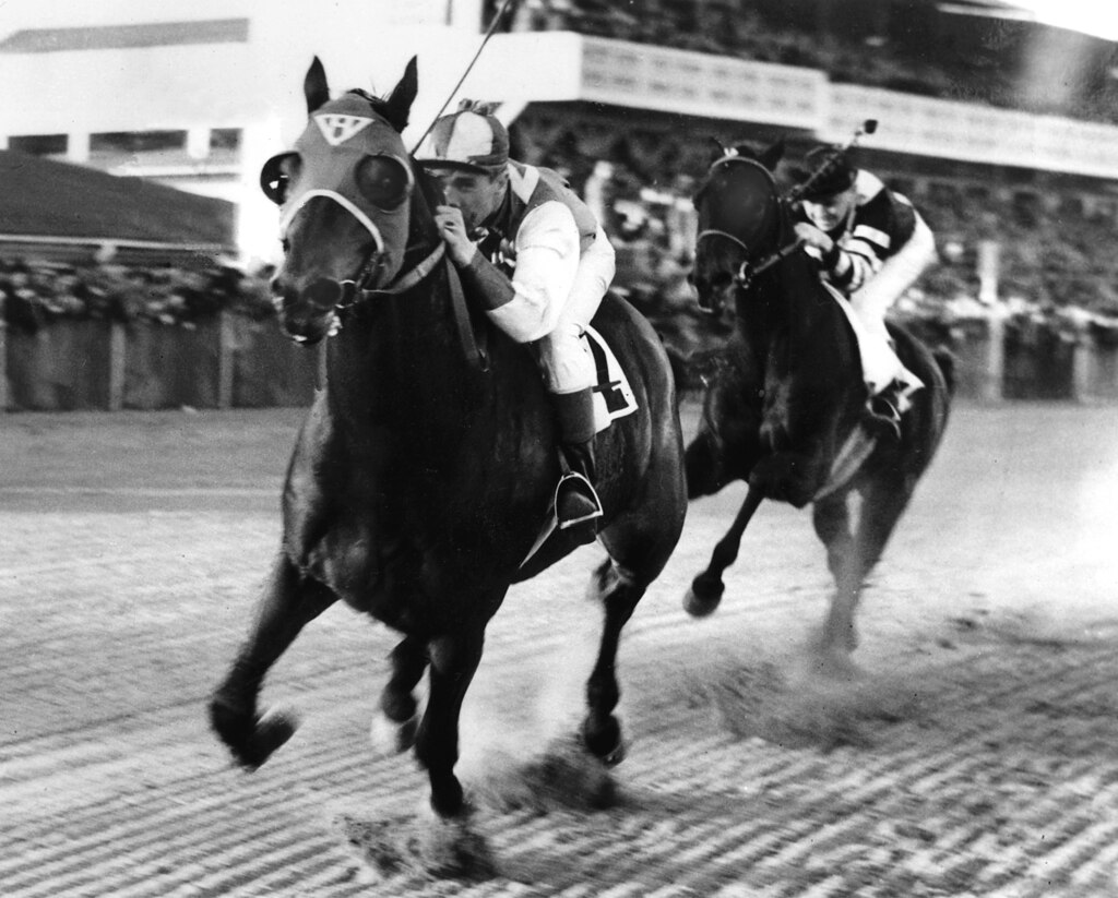 Seabiscuit and jockey George Woolf lead War Admiral and jockey Charles Kurtsinger in the first turn in a race at Pimlico in Baltimore, Md., Nov. 1, 1938. Seabiscuit won and set a new track record. Horses like Seabiscuit, Man O’War and Secretariat were well known in their time beyond racing circles, pop culture icons fed in part by radio, newspapers and, eventually, TV.