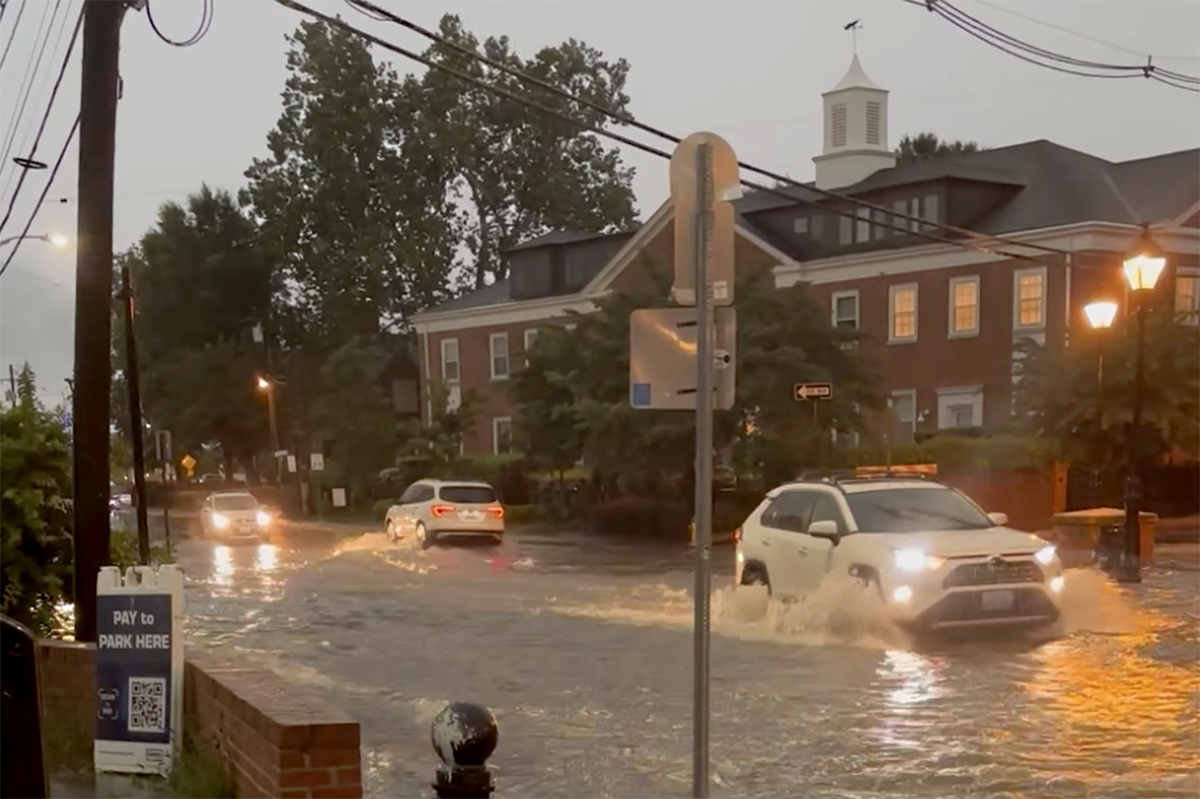 Cars driving along Compromise Street in Annapolis on Wednesday, July 9, 2025, after a downpour.