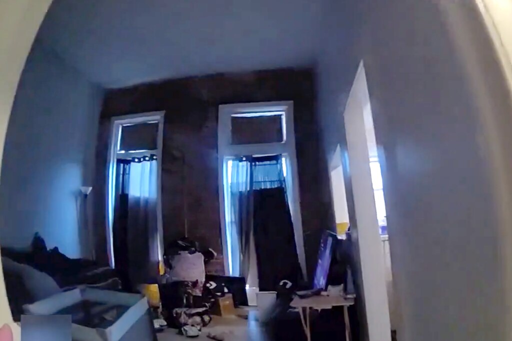 Footage from a police body camera of the PHA Healthcare-run apartment where Ashley Shaw and her son died.