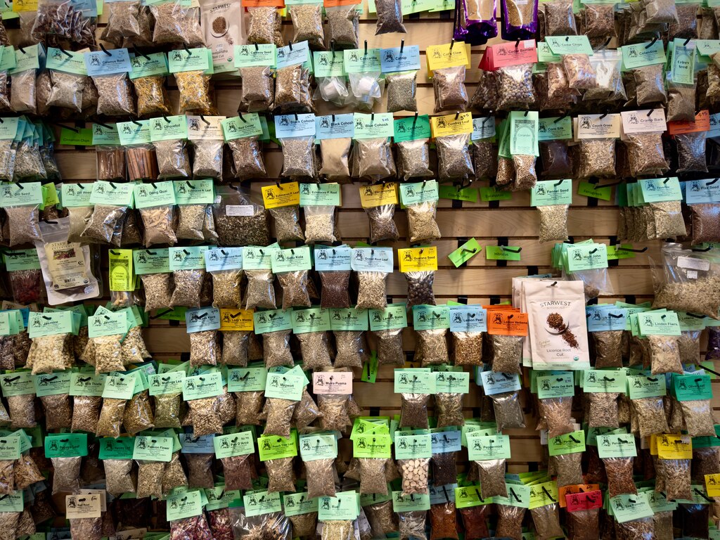 Wall of herbs on display at The Crystal Fox in Laurel.