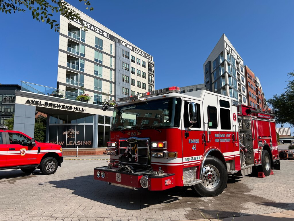 Fire trucks outside the Axel Brewers Hill apartment complex