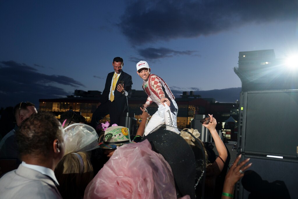 Umberto Rispoli makes an appearance with fans after T-Pain’s performance on Preakness Day at Pimlico Race Course on Saturday, May 17, 2025.