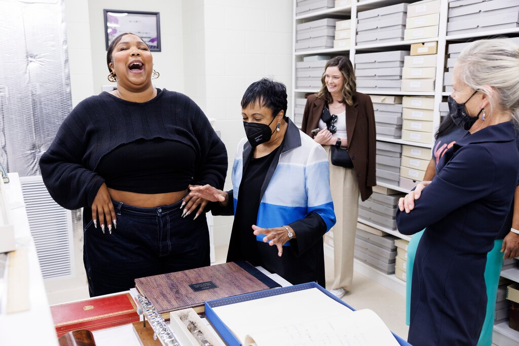 Lizzo joins Librarian of Congress Carla Hayden in the flute vault at the Library of Congress on Sept. 26, 2022.