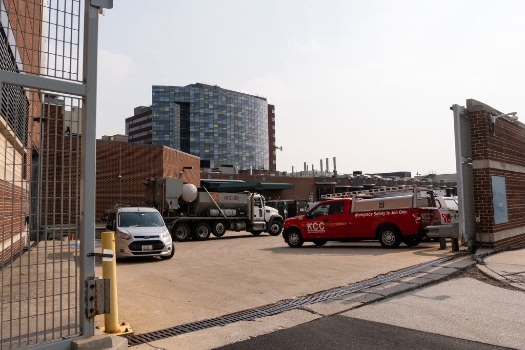 Traffic and closed streets around a Johns Hopkins Hospital facility at 1780 East Fayette Street in Baltimore on Thursday, June 5, 2025, the suspected source of an oil spill that happened Wednesday in the East Harbor.