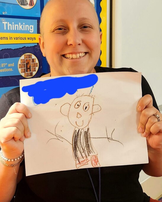 One of Kayla Case's treasured possessions is a student drawing of her when she returned to school, "bald as can be."