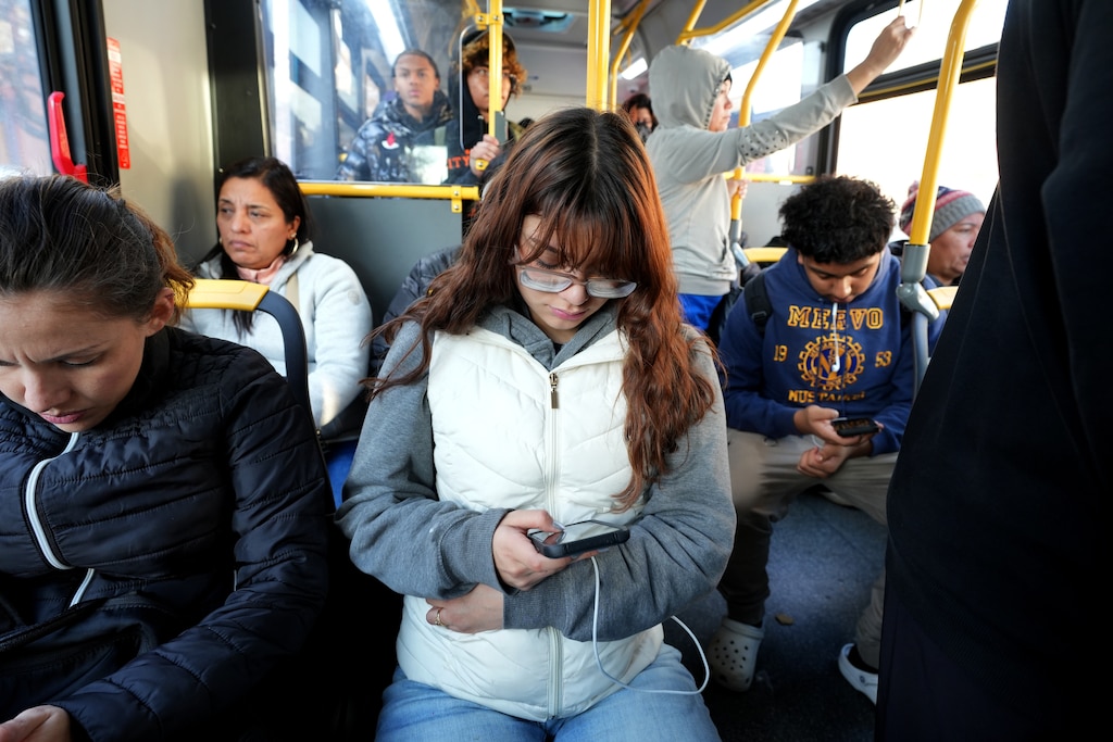 Angie Castro, a student at Digital Harbor High, has relied on the bus to get to school for years. Here, she rides the bus home after school in 2023.