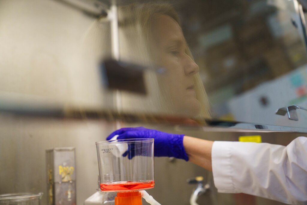 Karen Sfanos performs cell culture media in her lab at the David H. Koch Cancer Research Center of Johns Hopkins University on June 25, 2025.