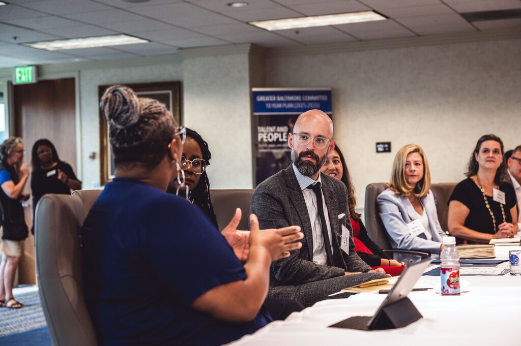 EDA Tech Hubs Program Director Eric Smith listens to Fearless Executive Director, Technology Growth Initiative LaToya C. Staten.