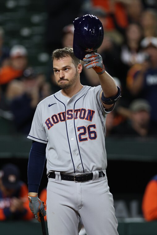 BALTIMORE, MARYLAND - SEPTEMBER 22: Trey Mancini #26 of the Houston Astros acknowledges the crowd during his first at bat against the Baltimore Orioles during the second inning at Oriole Park at Camden Yards on September 22, 2022 in Baltimore, Maryland. (Photo by Patrick Smith/Getty Images)