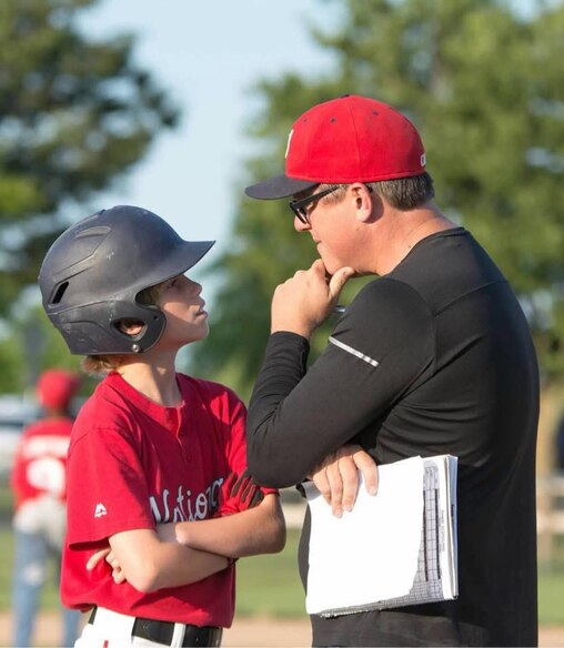 Darren Foxwell during a baseball game with his father Len Foxwell. Darren played sports since age four.