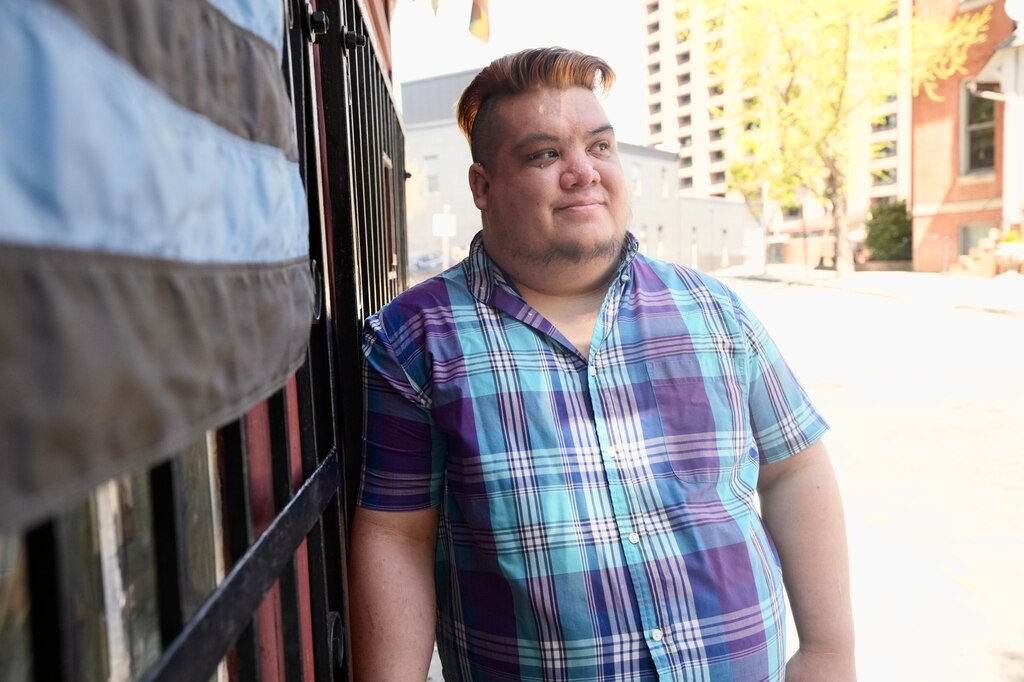 Adam Bencomo, 36, is a art professor and bartender who wrestled and ran cross country in high school, but he's never been allowed to give blood because he's gay. He is pictured here on April 11, 2023.