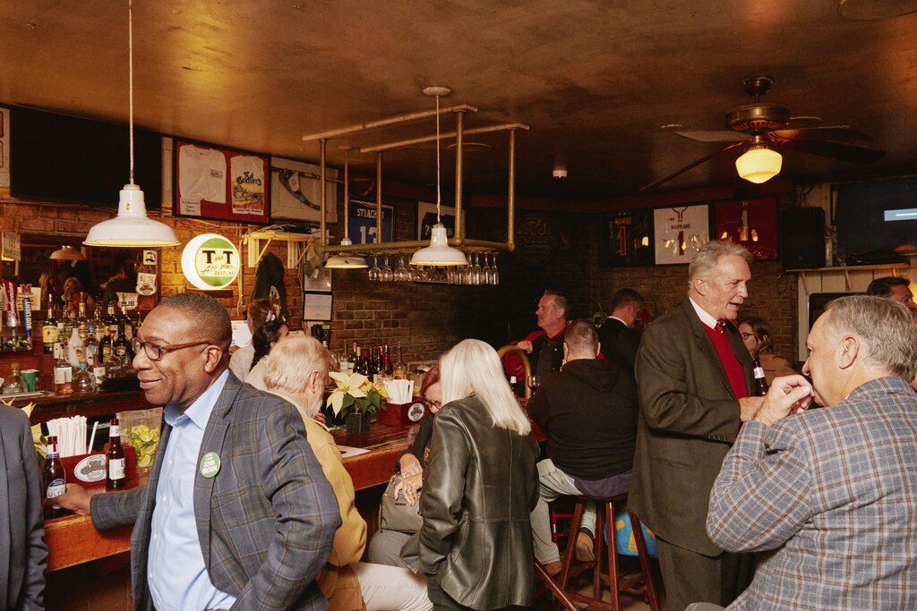 Friends, family, employees, and patrons gather at RJ Bentleys to celebrate the life of John Brown III.